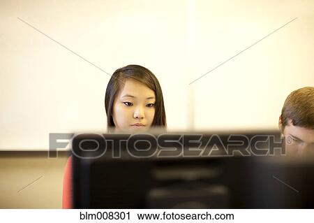 Students studying in computer lab View Large Photo Image Stock Image - Students studying in computer lab. Fotosearch
