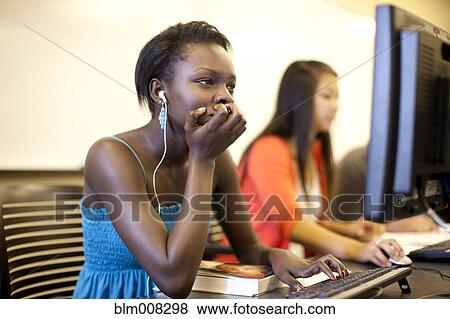 Stock Photo - Students studying in computer lab. Fotosearch