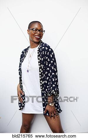 Stylish Black woman posing in dress View Large Photo Image Stock Photography - Stylish Black woman posing in dress. Fotosearch