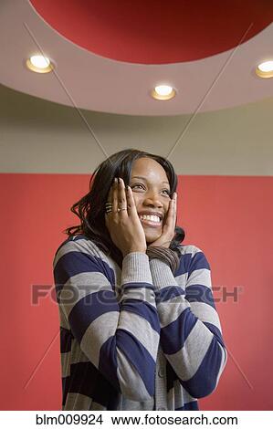 Picture - Surprised African American woman. Fotosearch