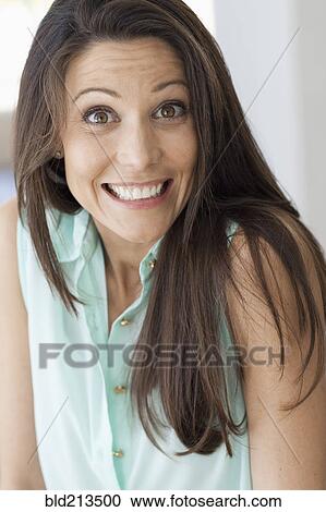 Surprised Caucasian woman shrugging View Large Photo Image Stock Image - Surprised Caucasian woman shrugging. Fotosearch