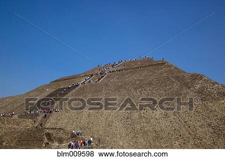 Stock Photo - Tourists at historical site of Teotihuacan. Fotosearch