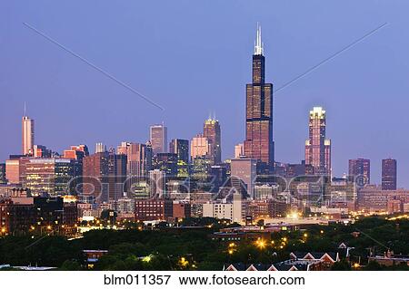 Stock Photo - Urban cityscape at night. Fotosearch
