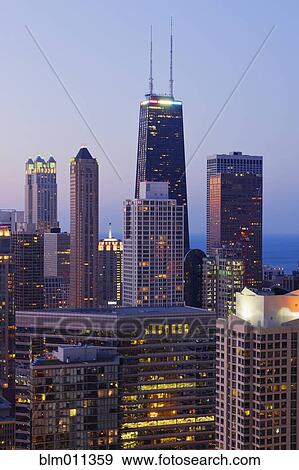 Stock Photo - Urban cityscape at night. Fotosearch