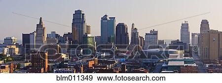 Stock Photo - Urban cityscape at sunrise. Fotosearch
