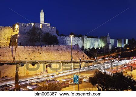 Walled area next to city commuter traffic View Large Photo Image Stock Photo - Walled area next to city commuter traffic. Fotosearch
