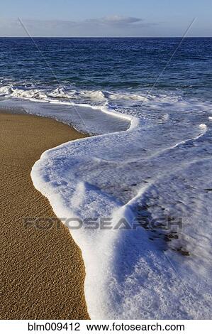 Stock Image - Waves on beach. Fotosearch