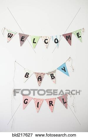 Welcome Baby Girl sign on wall View Large Photo Image Stock Photo - Welcome Baby Girl sign on wall. Fotosearch