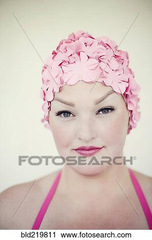 Woman wearing swim cap and bathing suit View Large Photo Image Stock Image - Woman wearing swim cap and bathing suit. Fotosearch