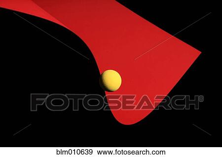 Yellow ball rolling down red slope View Large Photo Image Stock Photo - Yellow ball rolling down red slope. Fotosearch
