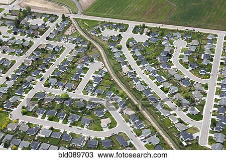 Stock Image - Aerial view of houses in community development. Fotosearch