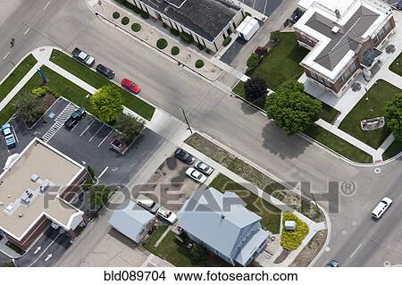 Aerial view of town roads and buildings View Large Photo Image Picture - Aerial view of town roads and buildings. Fotosearch