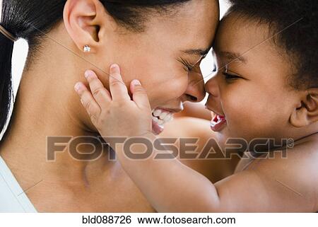African American mother bonding with baby boy View Large Photo Image Stock Photograph - African American mother bonding with baby boy. Fotosearch