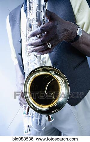 African American musician playing saxophone View Large Photo Image Stock Photograph - African American musician playing saxophone. Fotosearch