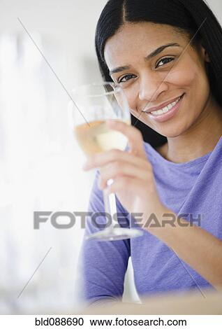 African American woman drinking white wine View Large Photo Image Stock Image - African American woman drinking white wine. Fotosearch