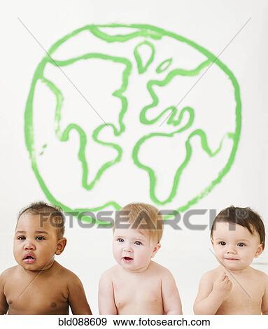 Stock Photo - Babies sitting together with drawing of globe on wall. Fotosearch