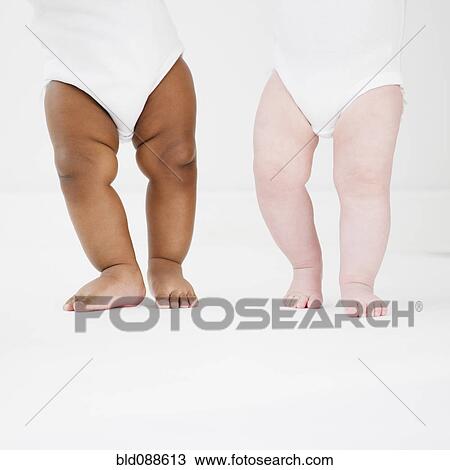 Babies walking together View Large Photo Image Stock Image - Babies walking together. Fotosearch