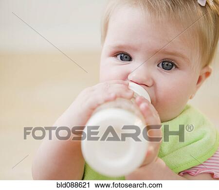Caucasian baby drinking bottle View Large Photo Image Stock Image - Caucasian baby drinking bottle. Fotosearch