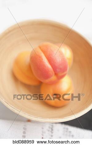 Stock Photo - Clingstone peaches in bowl. Fotosearch