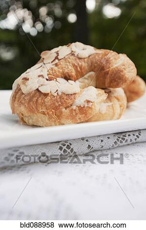 Close up of almond croissant View Large Photo Image Stock Photo - Close up of almond croissant. Fotosearch