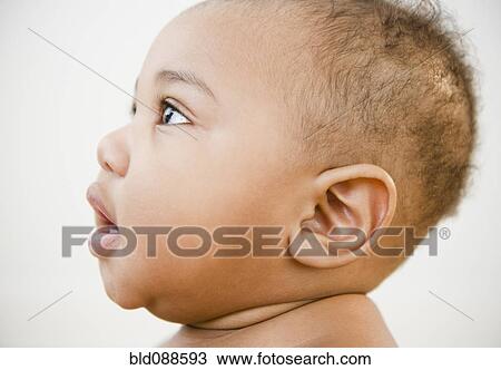 Close up of curious Black baby View Large Photo Image Stock Image - Close up of curious Black baby. Fotosearch