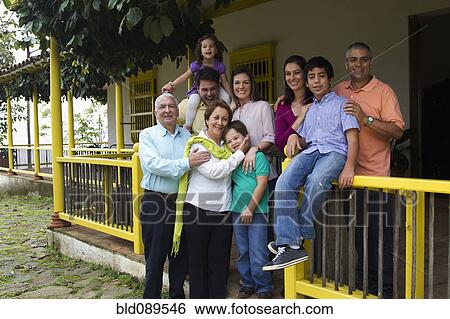 Family standing on porch together View Large Photo Image Stock Photograph - Family standing on porch together. Fotosearch
