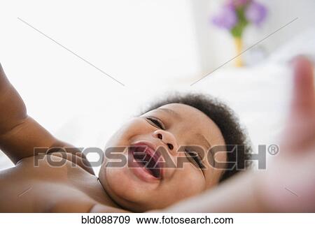 Grinning African American baby boy View Large Photo Image Stock Photo - Grinning African American baby boy. Fotosearch