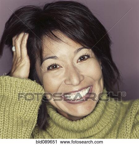 Grinning mixed race woman View Large Photo Image Stock Image - Grinning mixed race woman. Fotosearch