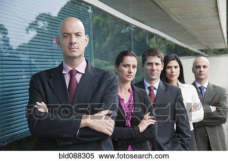 Hispanic business people standing in row together View Large Photo Image Stock Photography - Hispanic business people standing in row together. Fotosearch