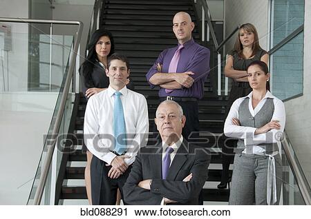 Hispanic business people standing together on staircase View Large Photo Image Stock Image - Hispanic business people standing together on staircase. Fotosearch