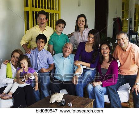 Hispanic family sitting on porch together View Large Photo Image Stock Photo - Hispanic family sitting on porch together. Fotosearch