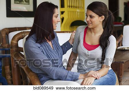 Stock Photo - Mother and daughter talking. Fotosearch