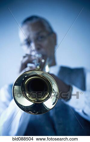 Musician playing trumpet View Large Photo Image Picture - Musician playing trumpet. Fotosearch