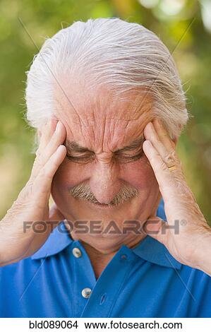 Picture - Senior Hispanic man with headache. Fotosearch