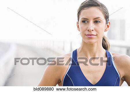 Serious Hispanic woman in sportswear View Large Photo Image Stock Image - Serious Hispanic woman in sportswear. Fotosearch
