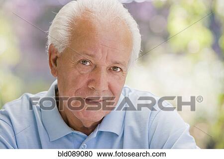 Stock Image - Serious senior Hispanic man. Fotosearch