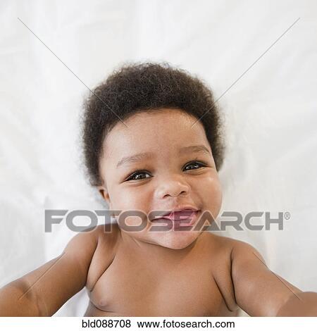 Smiling African American baby boy View Large Photo Image Stock Photo - Smiling African American baby boy. Fotosearch