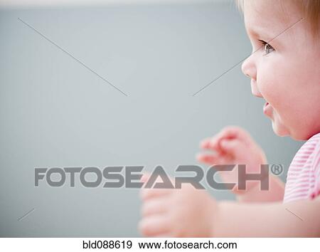 Stock Photo - Smiling Caucasian baby. Fotosearch