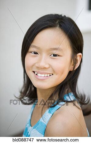 Smiling Chinese girl View Large Photo Image Stock Photo - Smiling Chinese girl. Fotosearch
