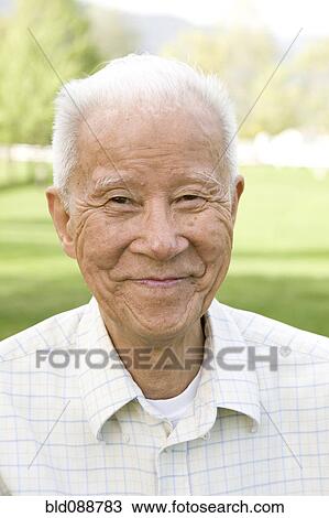 Smiling senior Chinese man View Large Photo Image Stock Image - Smiling senior Chinese man. Fotosearch