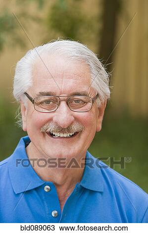 Stock Image - Smiling senior Hispanic man. Fotosearch
