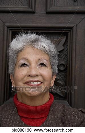 Stock Image - Smiling senior Hispanic woman. Fotosearch