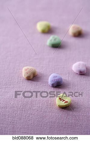 Stock Photo - Valentine candy heart with the letters "wtf" on it. Fotosearch