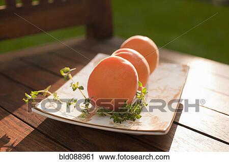 Virginia yellow peaches on platter View Large Photo Image Stock Image - Virginia yellow peaches on platter. Fotosearch