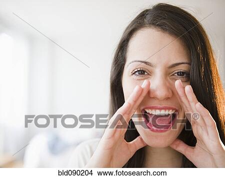 Picture - Brazilian woman shouting. Fotosearch
