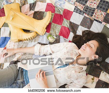Brazilian woman taking a nap View Large Photo Image Stock Photograph - Brazilian woman taking a nap. Fotosearch