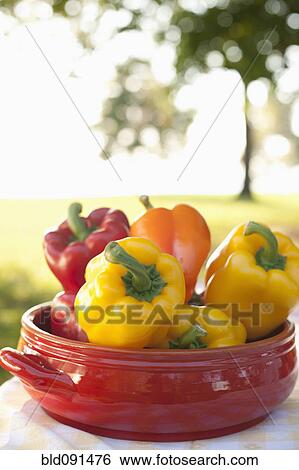 Stock Photograph - Close up of bell peppers in bowl. Fotosearch