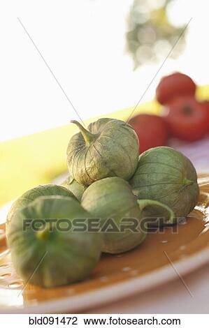 Stock Image - Close up of pods on plate. Fotosearch