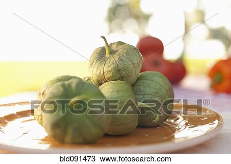 Stock Image - Close up of pods on plate. Fotosearch