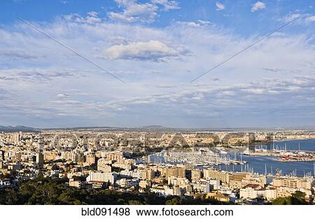 Stock Photo - Crowded city with boats in marina. Fotosearch